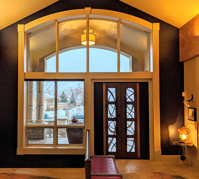 Interior photo of custom modern double door iron entry, multicolor iron finish, satin glass, Patented Thermal Break