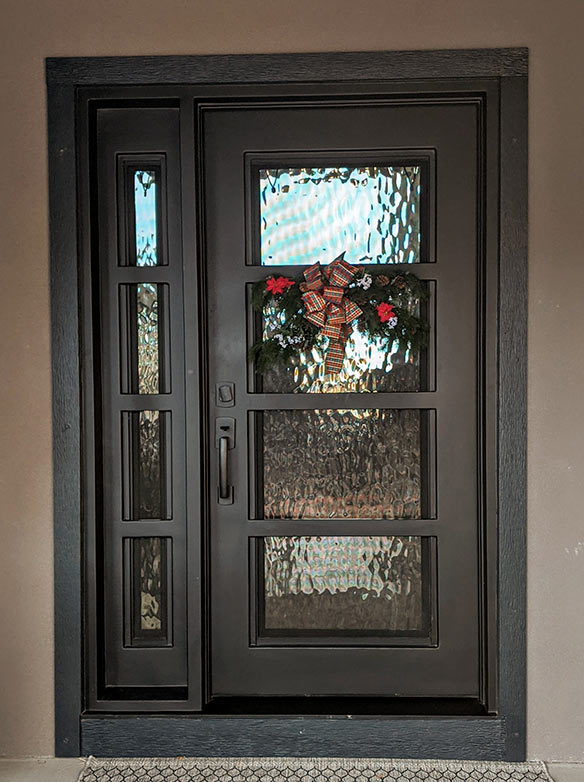 Custom design iron entry double round-top doors with square frame, glass corners with scrollwork, Flemish glass, Patented Thermal Break, Antique Bronze finish