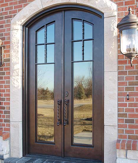 Country Farmhouse style arched double door front entry, stock Tuscan Collection, Patented Thermal Break, Copper Patina, clear glass