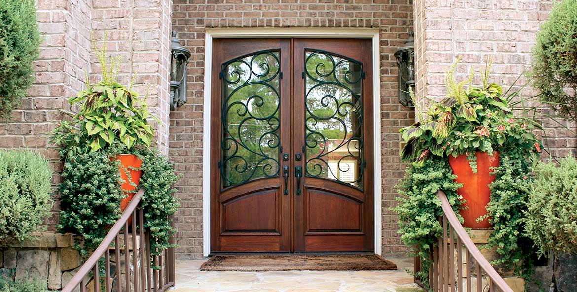 Tuscan style double entry doors, square top w/inner arch, swirled iron scroll operable grill, Burlwood, Aberdeen Collection