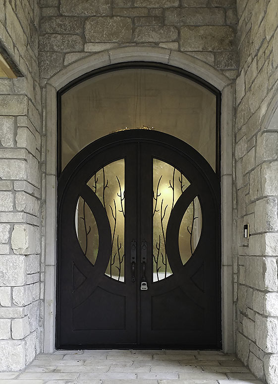 Custom Iron door double entry, contemporary style, arched top w/ transom, tree branch grill, Black finish, circle glass panel, clear glass, Patented Thermal Break